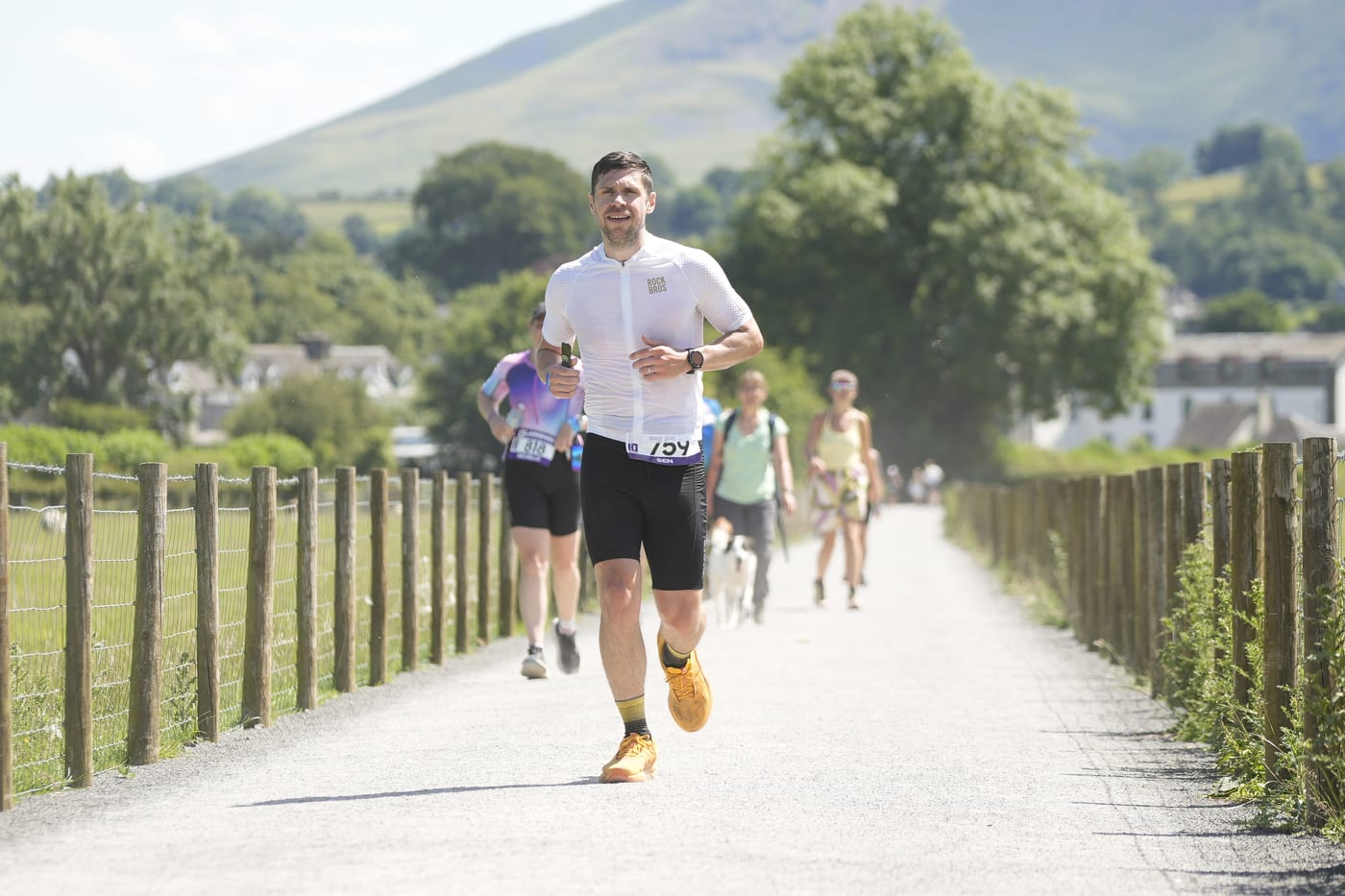 Runner on the lakeside path during the Lakesman run