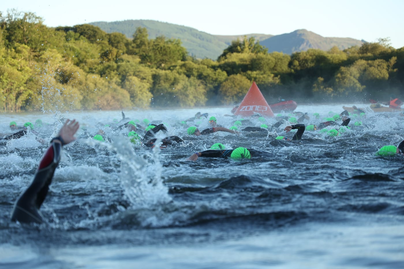 Mass open-water swim start on Derwentwater